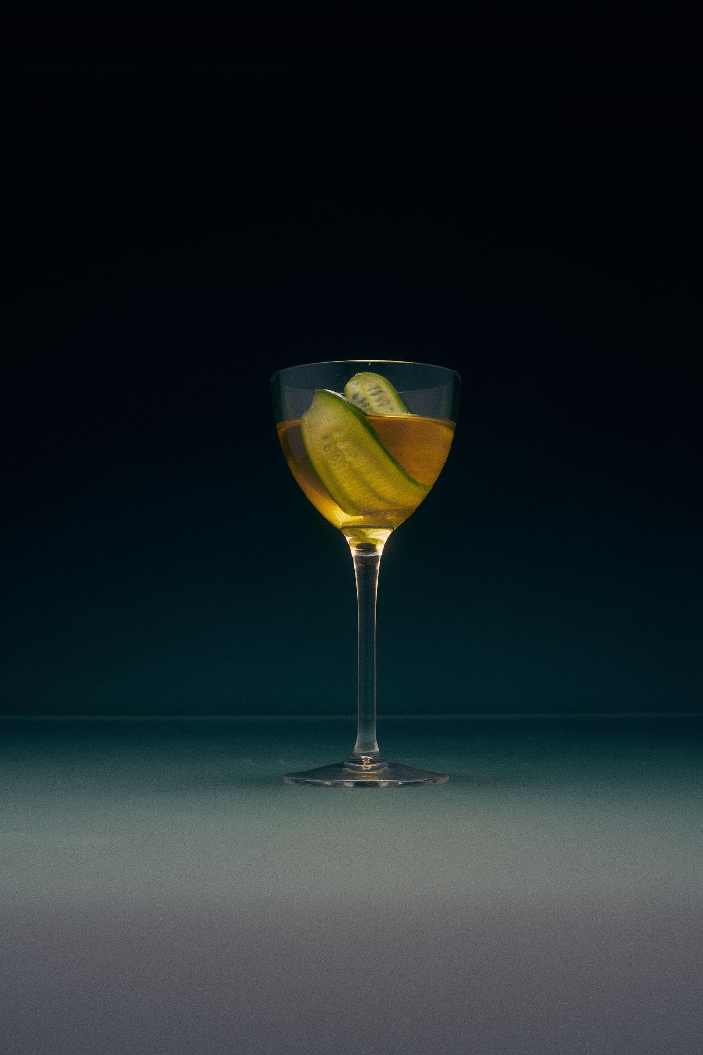 Cucumber Lime Mint Wild Mannered all-natural soju cocktail with cocktail glass, cucumber, lime and mint