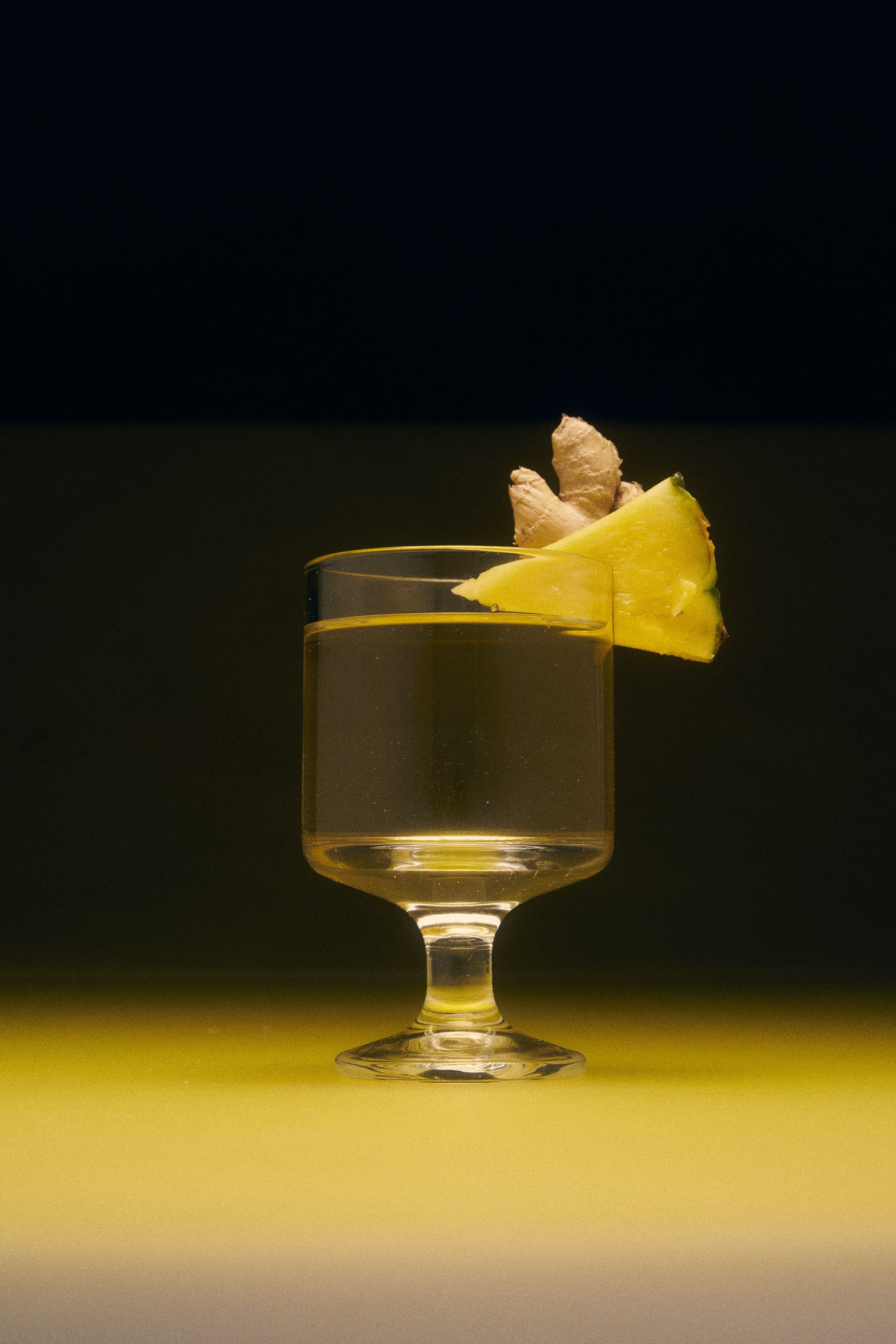 Pineapple Ginger Wild Mannered all-natural soju cocktail with cocktail glass, pineapple and ginger