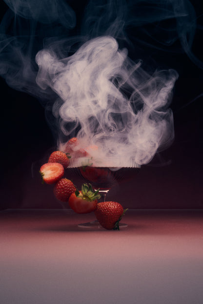 Strawberry Basil Wild Mannered all-natural soju cocktail with cocktail glass, strawberries and smoke