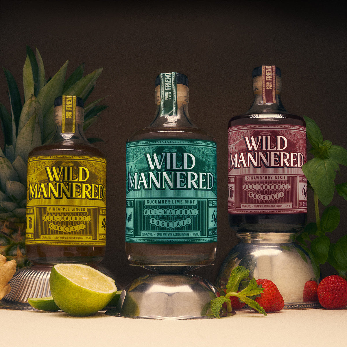 Group of 375 ml bottles of Cucumber Lime Mint, Pineapple Ginger, Strawberry Basil Wild Mannered all-natural cocktails